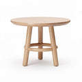 Round wooden coffee table with a natural finish measuring 50 x 50 x 40cm